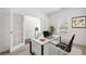 Bright office space with french doors, neutral walls, and large window perfect for working remotely at 1390 Napa Valley Sw Dr, Lawrenceville, GA 30045