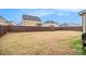 Large, fenced backyard with plenty of space for recreation, providing privacy and security for Gathering and pets at 182 Broder Farms Dr, Stockbridge, GA 30281