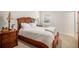 Bedroom showcasing a queen bed, and a large window at 182 Broder Farms Dr, Stockbridge, GA 30281