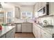 Modern kitchen featuring granite countertops, stainless steel appliances, subway tile backsplash and hardwood floors at 182 Broder Farms Dr, Stockbridge, GA 30281