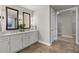 Bright bathroom with double vanity, marble countertop, and modern fixtures at 270 17Th Nw St # 3905, Atlanta, GA 30363