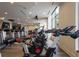 Modern fitness center equipped with stationary bikes and treadmills, featuring sleek design and ample natural light at 270 17Th Nw St # 3905, Atlanta, GA 30363
