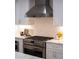Gourmet kitchen features stainless steel appliances and sleek white cabinetry at 270 17Th Nw St # 3905, Atlanta, GA 30363