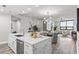 Open floor plan with kitchen featuring stainless steel appliances and marble island at 270 17Th Nw St # 3905, Atlanta, GA 30363
