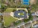 Expansive estate features a circular driveway, lush landscaping, and a central courtyard at , Roswell, GA 30075