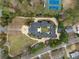 Expansive estate features a circular driveway, lush landscaping, and a central courtyard at , Roswell, GA 30075