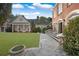 Spacious backyard featuring a stone patio and expansive lawn at , Roswell, GA 30075