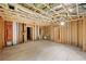 Unfinished basement with wood framing, insulation, and exposed ceiling at , Roswell, GA 30075