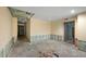 Unfinished basement ready for customization with exposed insulation and concrete floor at , Roswell, GA 30075
