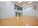 Full-sized indoor basketball court with hardwood floors, high ceilings, and observation deck at , Roswell, GA 30075
