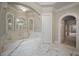 Luxurious bathroom with marble floors, soaking tub, and arched mirrors at , Roswell, GA 30075