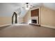 Cozy bedroom featuring a fireplace with brick surround and soft carpeting at , Roswell, GA 30075
