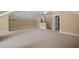 Spacious bonus room with carpet flooring, neutral paint and a view of the entry stair at , Roswell, GA 30075