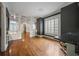 Open-concept dining room with hardwood floors, designer paint, and ample natural light at , Roswell, GA 30075