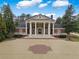 Stately brick home with mature trees and grand front entrance at , Roswell, GA 30075