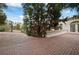 Brick patio off the side of the house with trees for shade at , Roswell, GA 30075