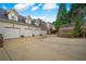 Four-car garage connected to the main house via brick archway at , Roswell, GA 30075