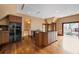 Open concept kitchen with wood floors, modern appliances, island and access to a balcony at , Roswell, GA 30075