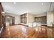 Hardwood floored living room area with natural light and dark wood trim throughout at , Roswell, GA 30075