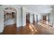 Elegant living room with hardwood floors, grand columns and detailed trim at , Roswell, GA 30075