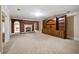 Spacious living room featuring a brick fireplace and custom built-in shelving at , Roswell, GA 30075