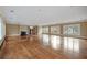 Expansive living room featuring a fireplace, hardwood floors, and natural light at , Roswell, GA 30075