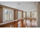 Bright, open living room featuring hardwood floors and plantation shutters at , Roswell, GA 30075