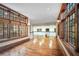 Bright living room featuring hardwood floors, large windows with natural light and wood trim at , Roswell, GA 30075