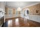 Elegant living room with hardwood floors, fireplace, and decorative wall coverings at , Roswell, GA 30075