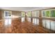 Spacious living room with hardwood floors and large windows offering abundant natural light at , Roswell, GA 30075