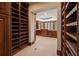 Walk-in closet featuring custom shelving and drawers, providing ample storage space at , Roswell, GA 30075