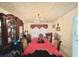 Elegant dining room with rich hardwood floors and decorative furnishings at 2782 Wynhaven Oaks Way, Lawrenceville, GA 30043