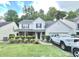Inviting two-story home features a two-car garage and meticulously maintained landscaping at 2782 Wynhaven Oaks Way, Lawrenceville, GA 30043