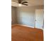 Nice bedroom featuring a ceiling fan, window, and closet space at 4300 Shady Lane Way, Forest Park, GA 30297