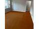 Charming living room offers bright natural light and beautiful hardwood flooring at 4300 Shady Lane Way, Forest Park, GA 30297
