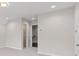 Bright bedroom featuring neutral paint and carpet, recessed lights and access to closet at 5115 N Pratt St, Covington, GA 30014
