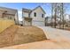 Charming two-story home with a garage and newly installed sod in the front yard at 5115 N Pratt St, Covington, GA 30014