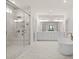 Luxury bathroom featuring double vanity, soaking tub, and glass enclosed shower at 2711 Twisted Oak Ne Ln, Marietta, GA 30066