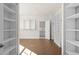Spacious walk-in closet with custom shelving units and ample storage at 2711 Twisted Oak Ne Ln, Marietta, GA 30066