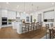 Bright, spacious kitchen featuring a large island, white cabinets, and modern appliances at 2711 Twisted Oak Ne Ln, Marietta, GA 30066