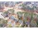 Residential neighborhood with beautiful greenery, a nearby pond and a lush golf course at 5485 Brookstone Nw Dr, Acworth, GA 30101