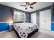 Cozy bedroom with carpeted floors, large window and closet space at 5485 Brookstone Nw Dr, Acworth, GA 30101