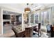 Dining room with hardwood floors and view to the sun room at 5485 Brookstone Nw Dr, Acworth, GA 30101