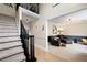 Spacious entryway with hardwood floors, staircase and sitting area at 5485 Brookstone Nw Dr, Acworth, GA 30101