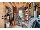 View of the unfinished garage area, complete with a workbench and ample storage solutions at 5485 Brookstone Nw Dr, Acworth, GA 30101