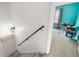 Upstairs hallway leads to a bright and airy room with a desk, chair and pops of color at 5485 Brookstone Nw Dr, Acworth, GA 30101