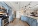 Spacious kitchen with stainless steel appliances, granite countertops, and abundant cabinet space at 5485 Brookstone Nw Dr, Acworth, GA 30101