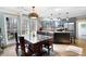 Kitchen with stainless steel appliances, granite countertop, island and view to dining room at 5485 Brookstone Nw Dr, Acworth, GA 30101