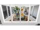Looking down from the third floor into a beautiful, bright, three-story atrium at 11260 Houze Rd, Roswell, GA 30076