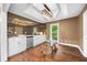 Stylish bar area with mirrored wall, marble countertop, and custom lighting at 11260 Houze Rd, Roswell, GA 30076